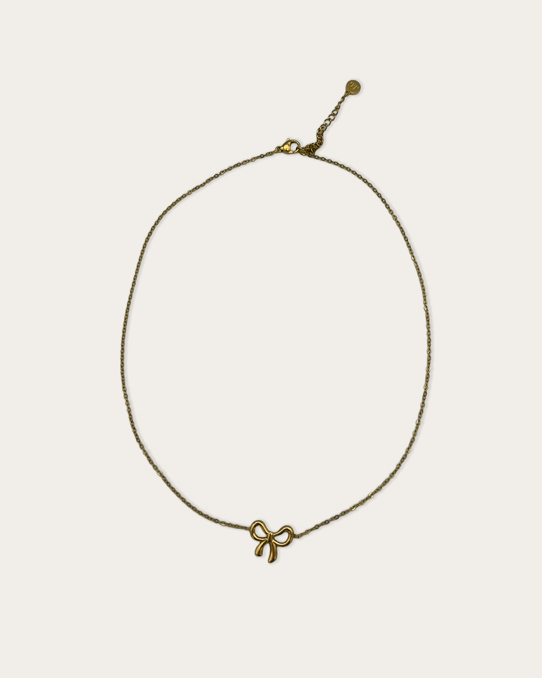 Bow necklace - Goud